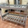 Heavy-duty commercial steel bunk bed manufactured by Reggo Trade in Turkey, designed for high-capacity use in industrial and institutional facilities.